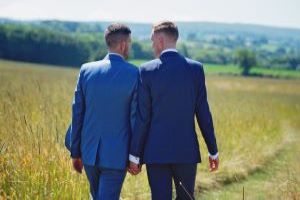 Same-sex couple holding hands