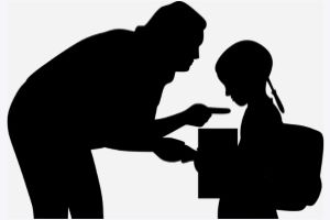 Silhouettes of a man scolding his daughter