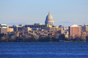view of madison wisconsin's skyline from the water